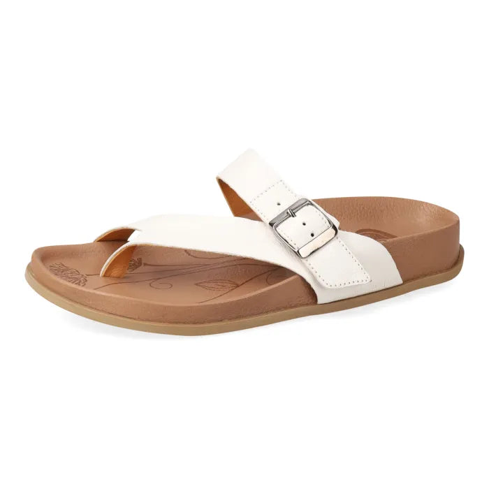 White sandal with brown sole on a white background