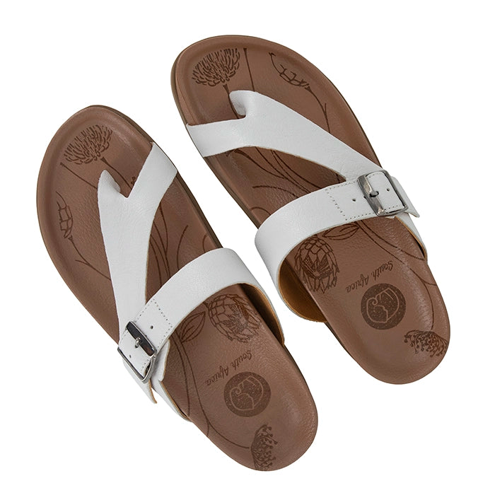 Pair of white sandals with a buckle on a white background