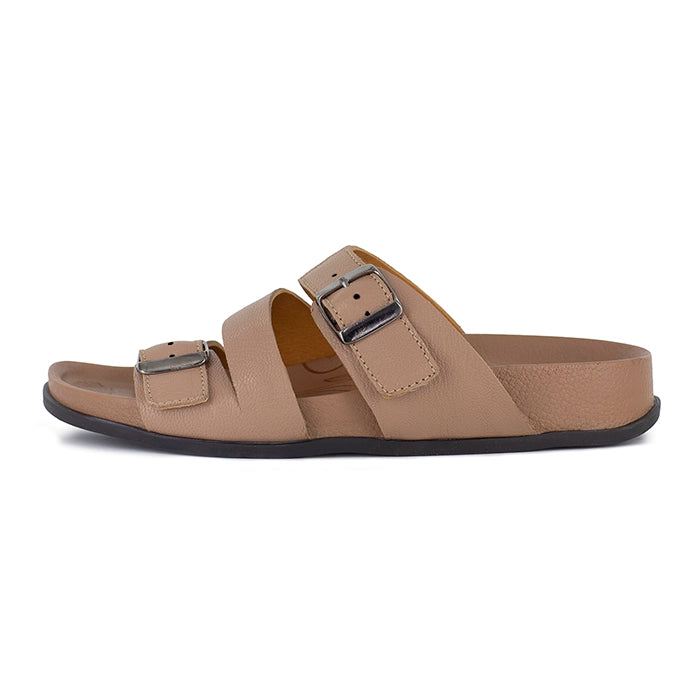 Beige sandal with double buckle strap on a white background