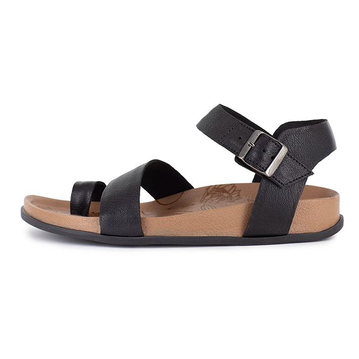 Black sandal with a brown sole on a white background