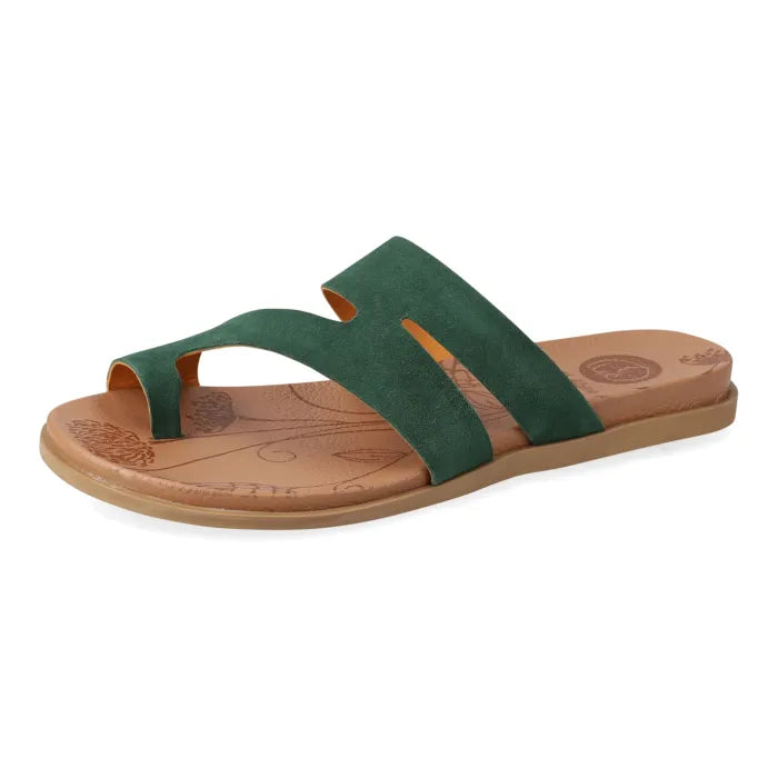 Green sandal with brown sole on a white background