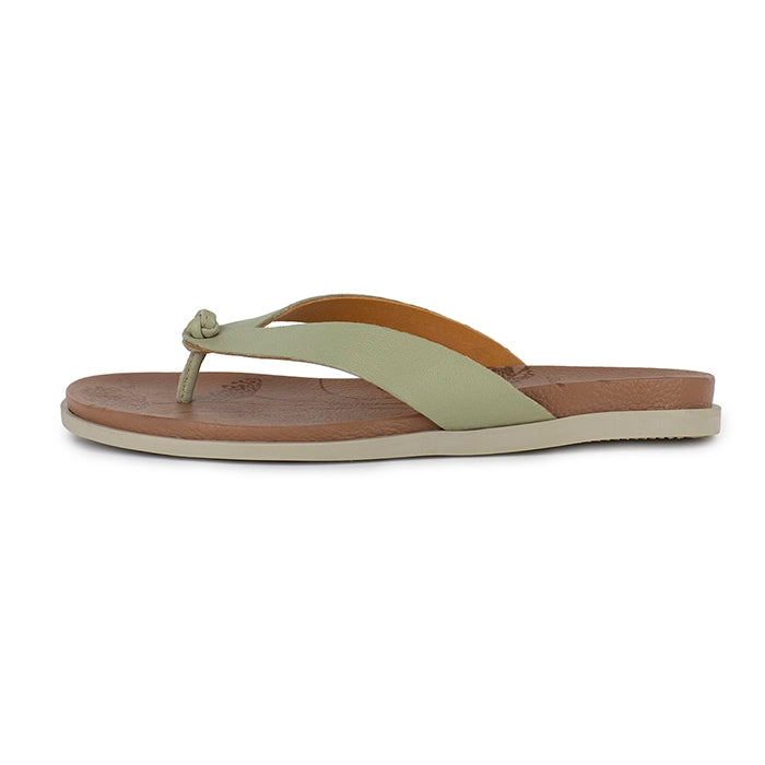 Flip-flop sandal with a brown sole and light green strap on a white background