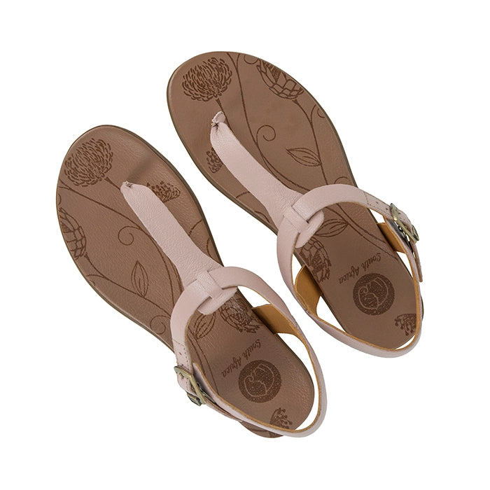 Pair of pink sandals with floral patterns on a white background