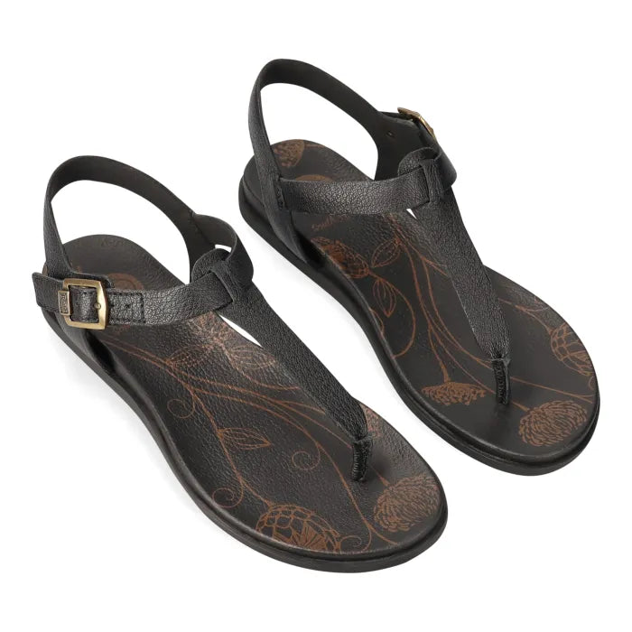 Black sandal with a gold buckle.