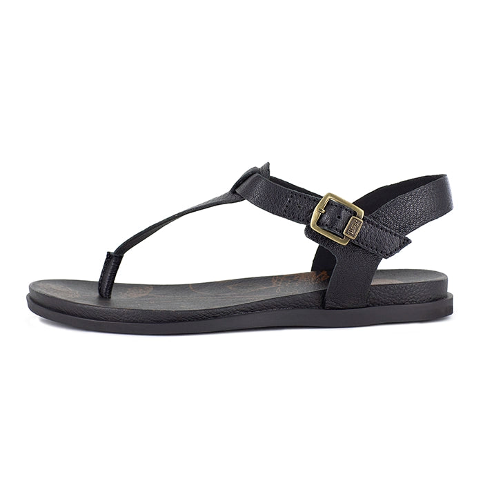 Black sandal with a gold buckle on a white background