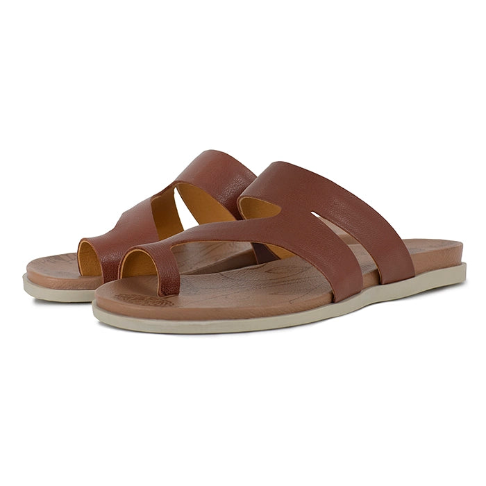Pair of brown sandals on a white background