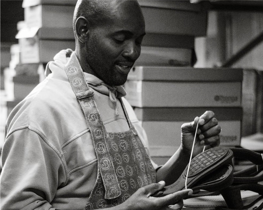 Handling soles of shoes for production