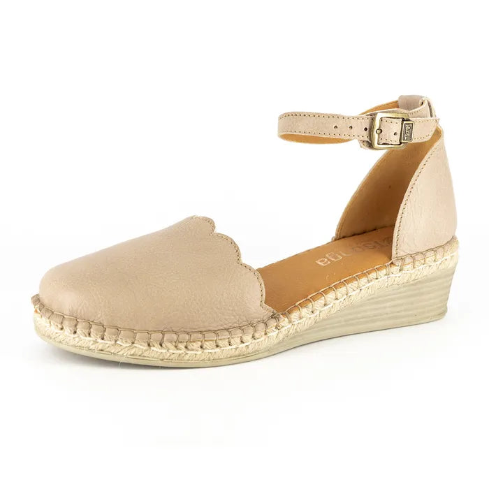 Beige wedge sandal with espadrille sole on a white background