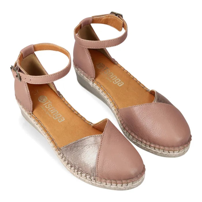 Pair of beige and metallic espadrille sandals on a white background