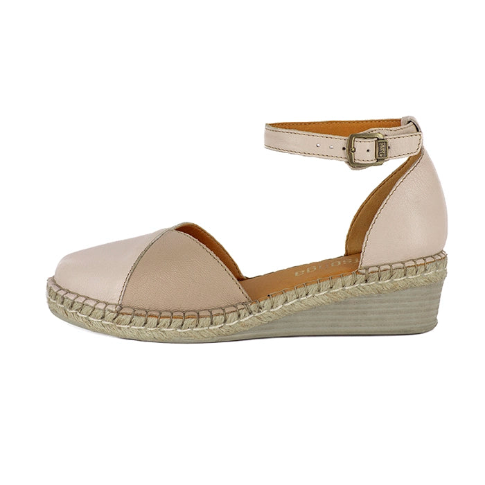 Beige wedge sandal with espadrille sole on a white background