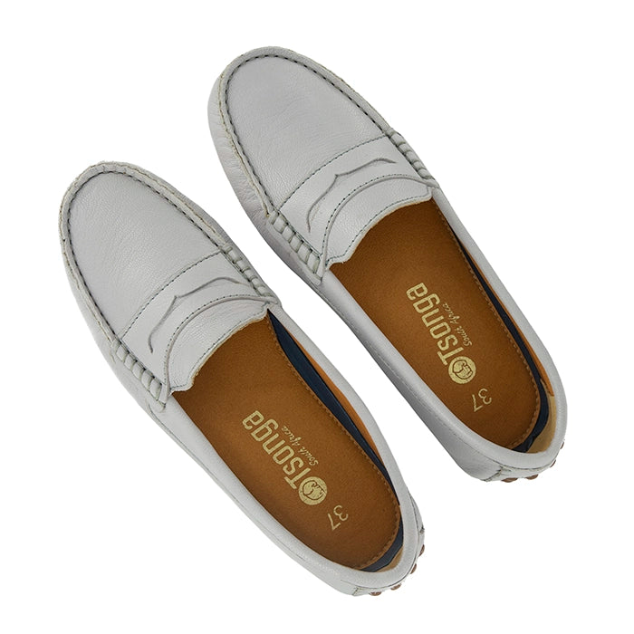 Pair of light gray loafers with brown insole on a white background