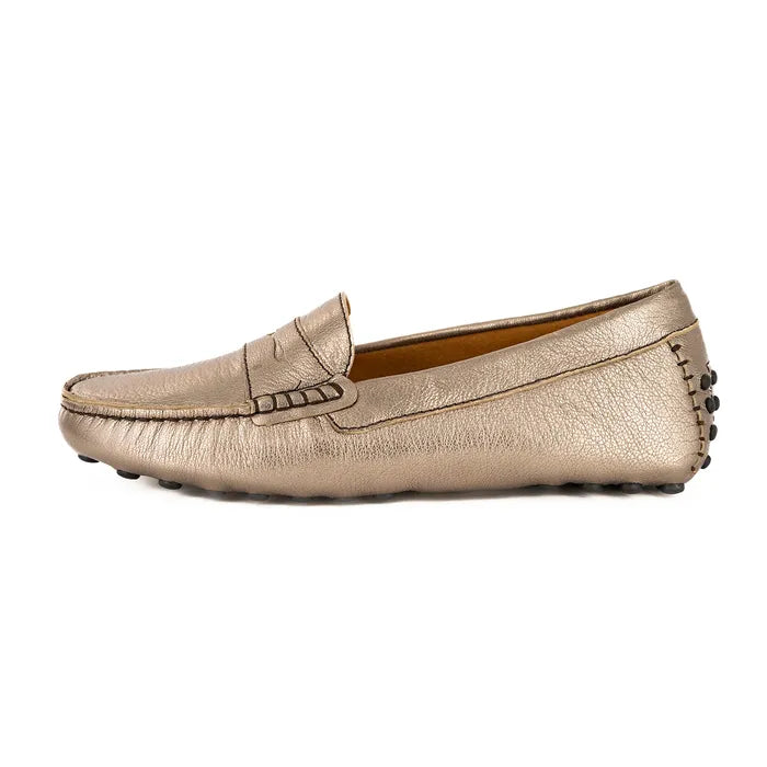 Gold loafer shoe on a white background