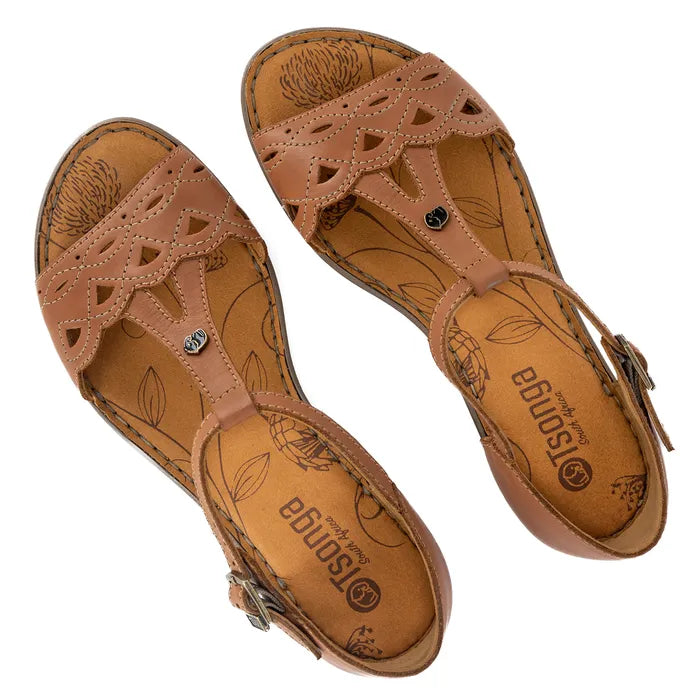 Pair of tan sandals with 'Island' branding on a white background