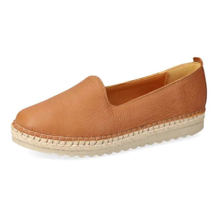Tan leather espadrille shoe on a white background