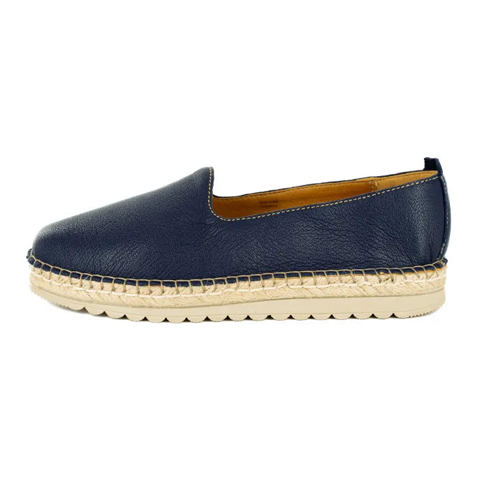 Navy blue espadrille shoe on a white background