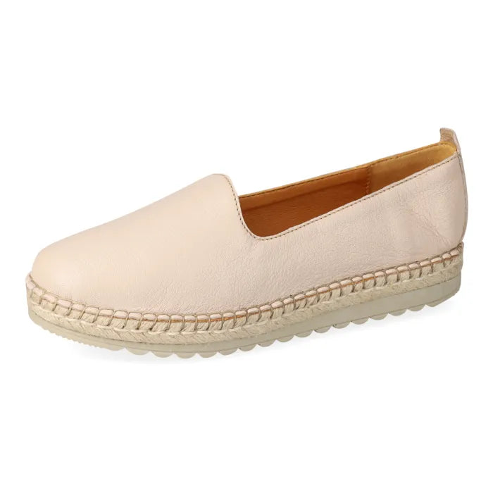 Beige espadrille shoe on a white background