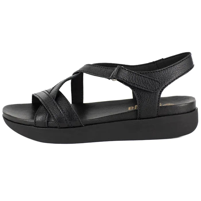 Black sandal with criss-cross straps on a white background