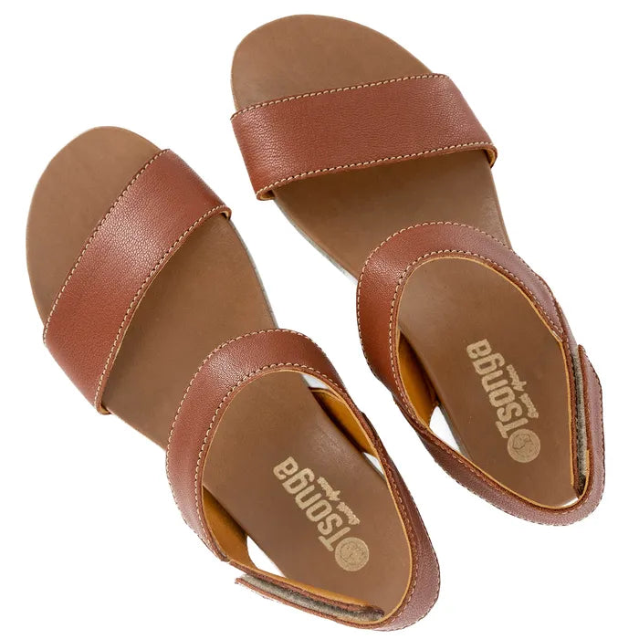 Pair of brown sandals with 'Tsonga' branding on a white background