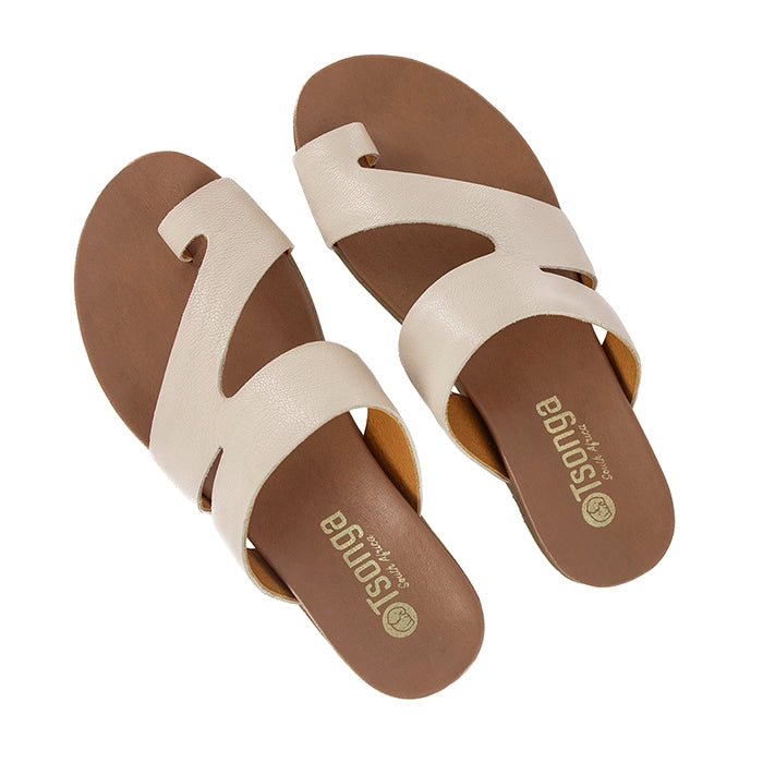 Pair of sandals with beige straps and brown soles on a white background