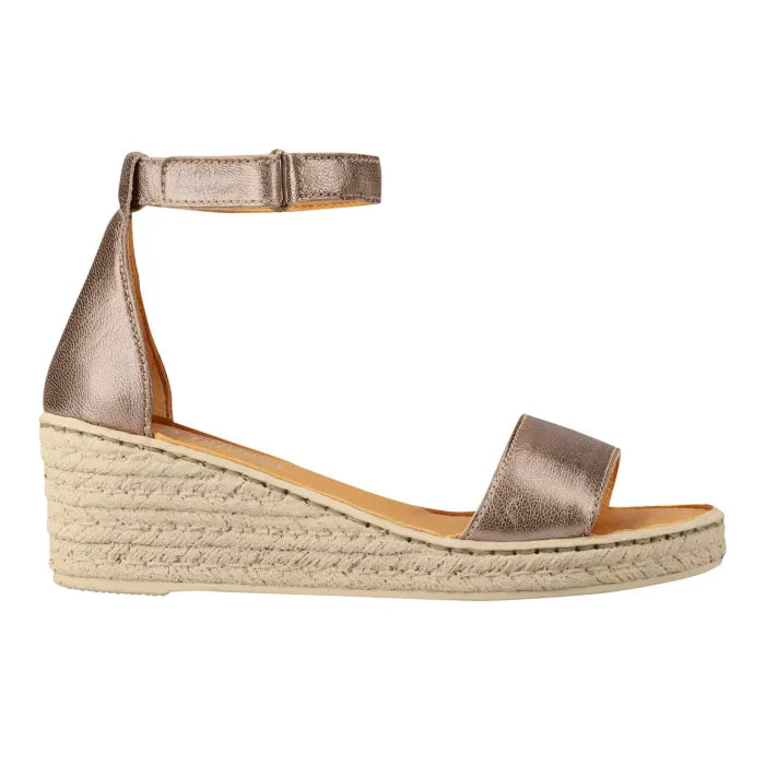 A metallic gold wedge sandal with an ankle strap and a platform sole, shown in a side profile on a white background.