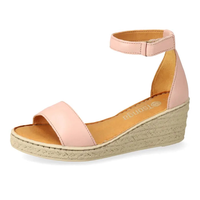 Pink wedge sandal with espadrille print sole on a white background