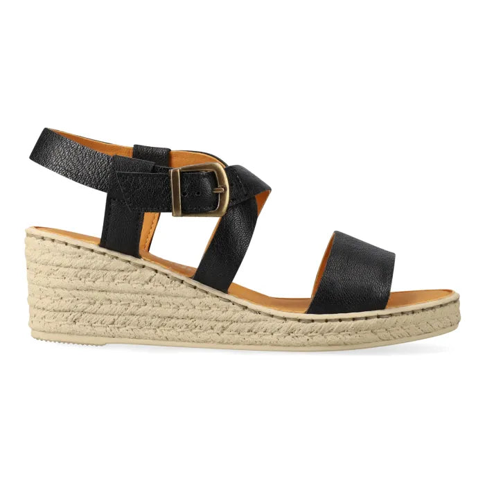 Black wedge sandal with espadrille print sole on a white background