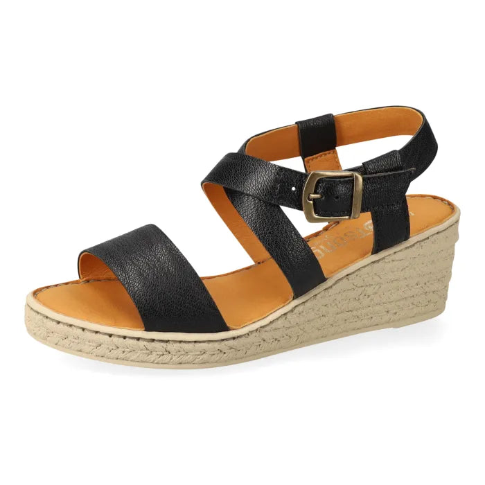 Black wedge sandal with tan sole on a white background