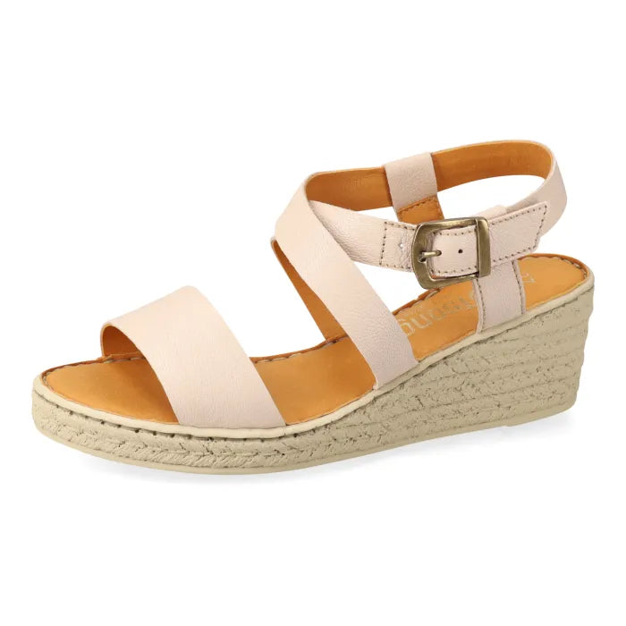 Beige wedge sandal with espadrille print sole on a white background