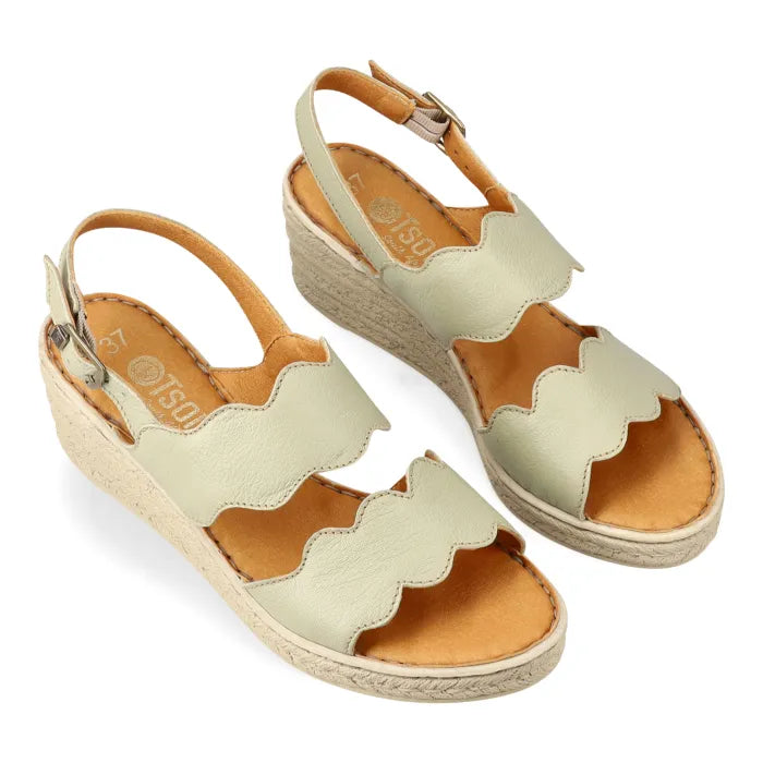 Mint wedge sandals on a white background