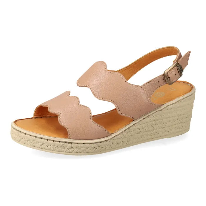 Beige wedge sandal with scalloped edges on a white background