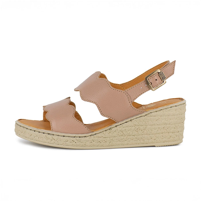 Beige wedge sandal on a white background
