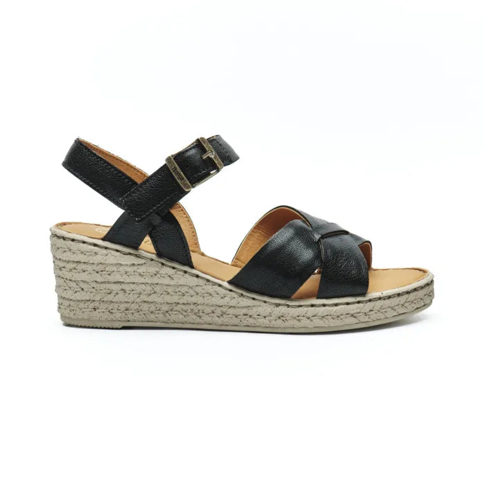 A single women's wedge sandal in black leather with a platform sole, shown in a side profile on a white background.