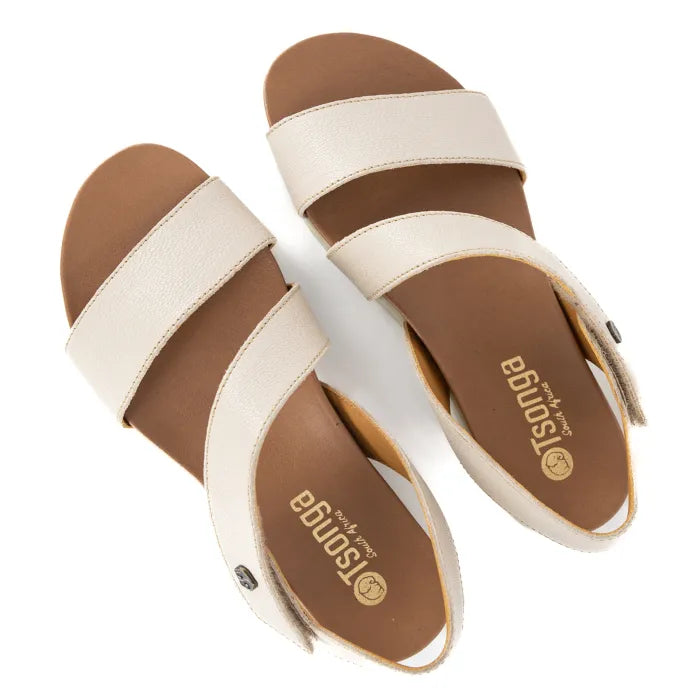 Pair of beige sandals with 'Tsonga' branding on a white background