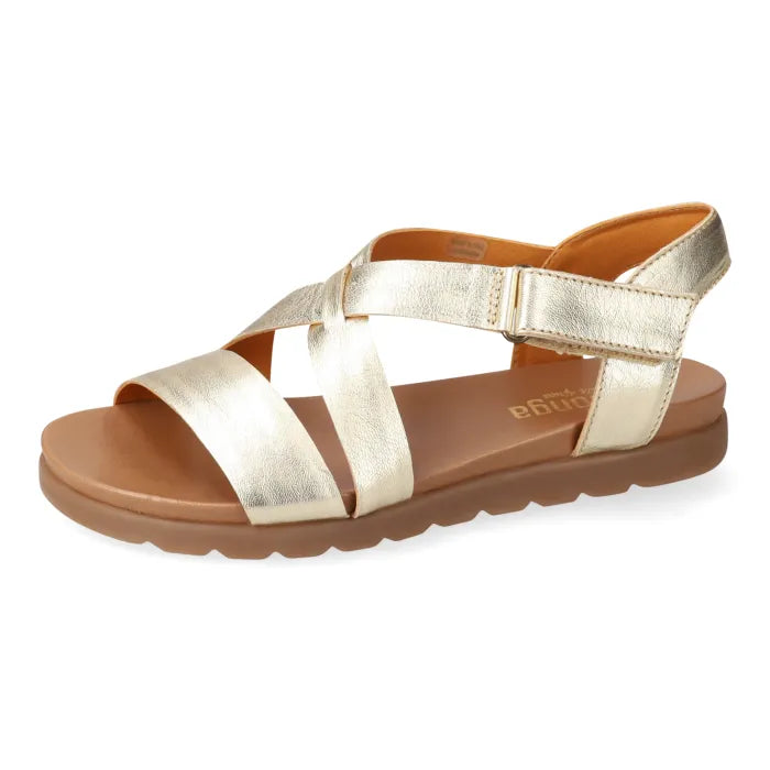 Gold sandal with brown sole on a white background