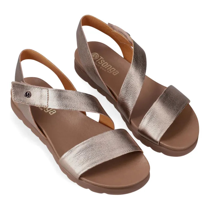 Pair of bronze sandals with 'Tsonga' branding on a white background