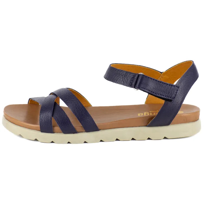 Navy sandal with a off white sole on a white background