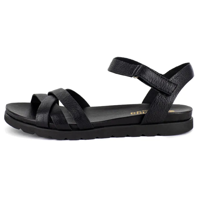 Black sandal with criss-cross straps on a white background