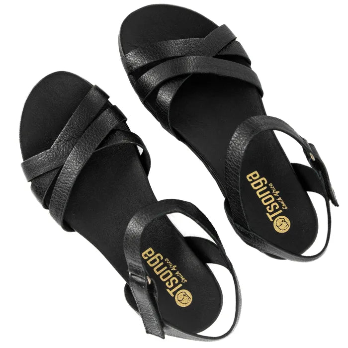 Black sandals with criss-cross straps on a white background