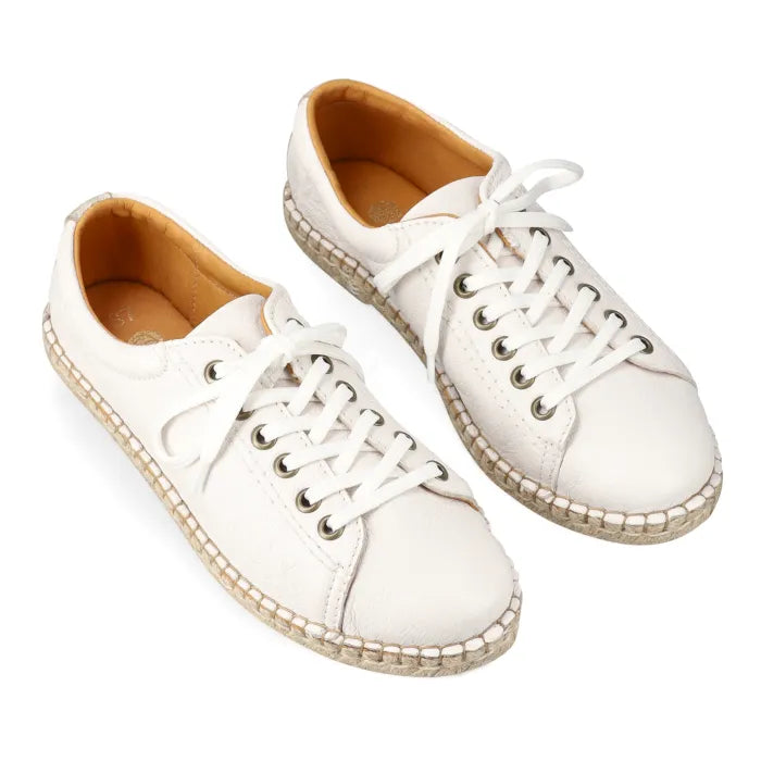 White sneaker with espadrille sole on a white background