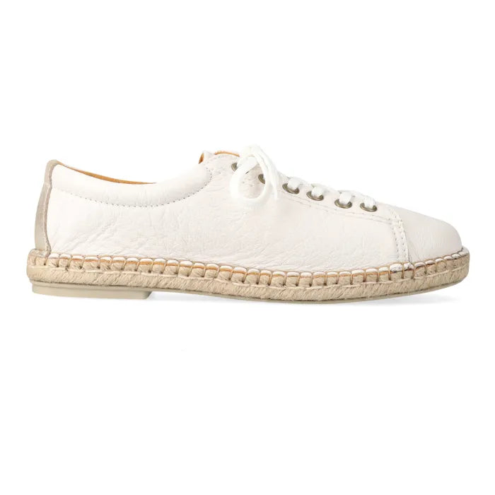 White sneaker with espadrille sole on a white background