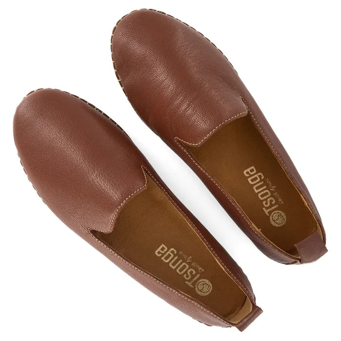 Pair of brown leather loafers on a white background