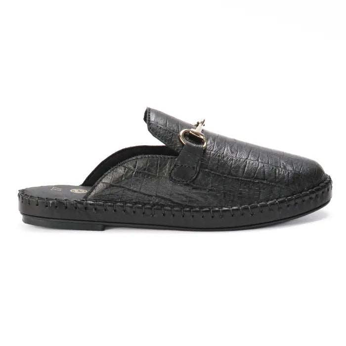 Black leather slip-on shoe with a decorative buckle on a white background
