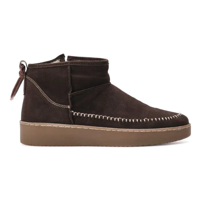 Brown suede ankle boot with white stitching on a white background