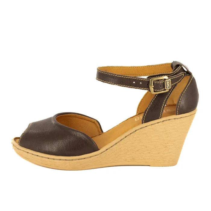 Brown wedge sandal with wedge sole on a white background