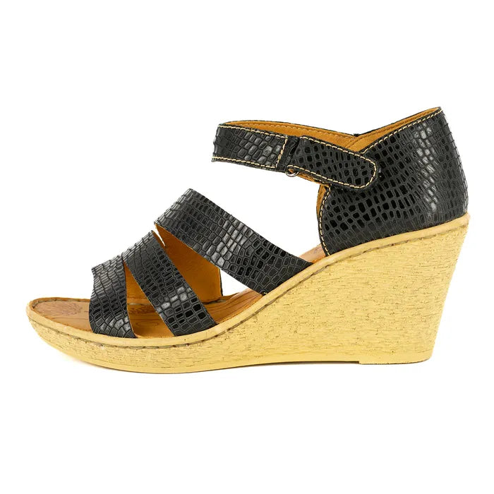 Black wedge sandal with a wedge sole on a white background