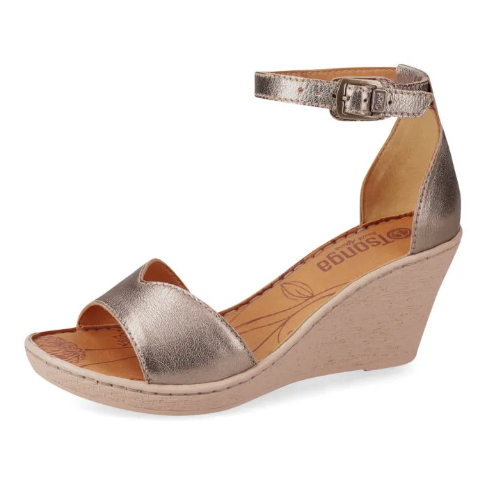 Wedge sandal with metallic strap and beige wedge on a white background