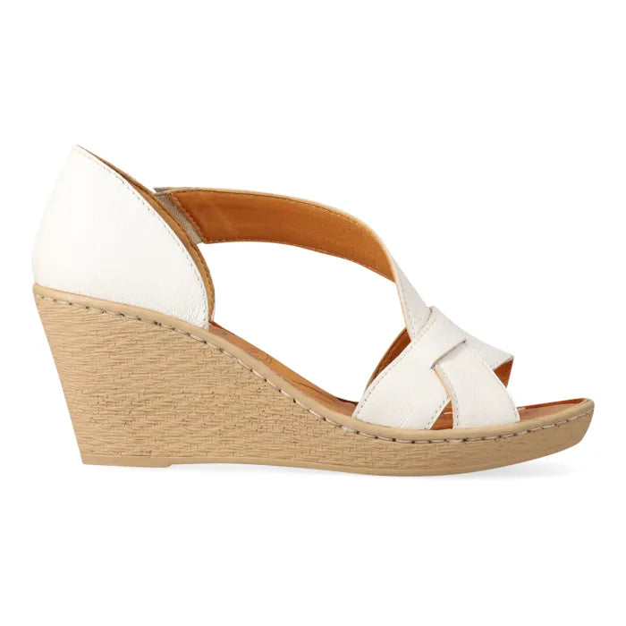 White wedge sandal with beige sole on a white background