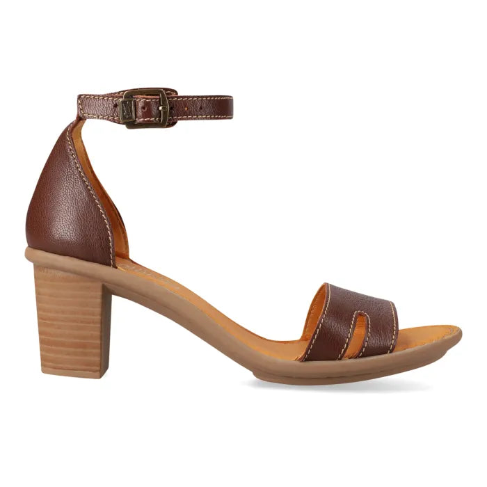 A brown leather block heel sandal with an adjustable ankle strap and a single front cutout, shown from a side profile on a white background.
