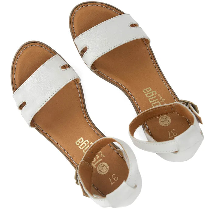 Pair of white sandals with brown soles on a white background