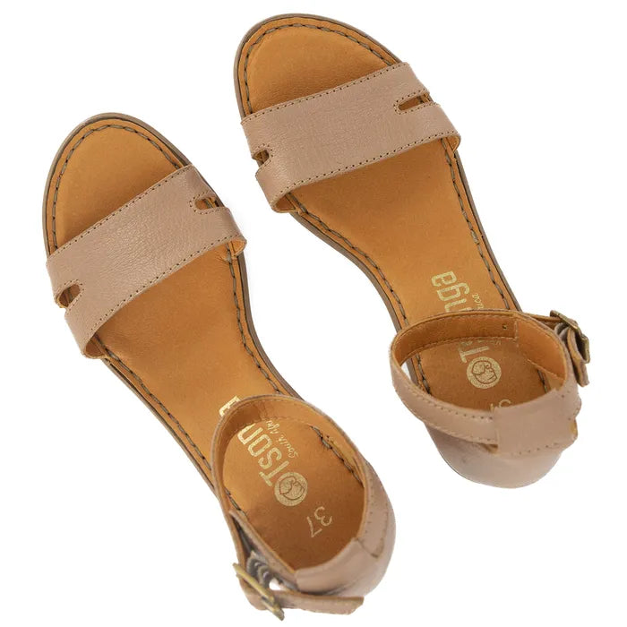 Pair of beige sandals with a visible brand logo on a white background